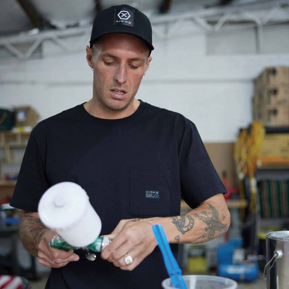x/dmg pocket short sleeve tee in black