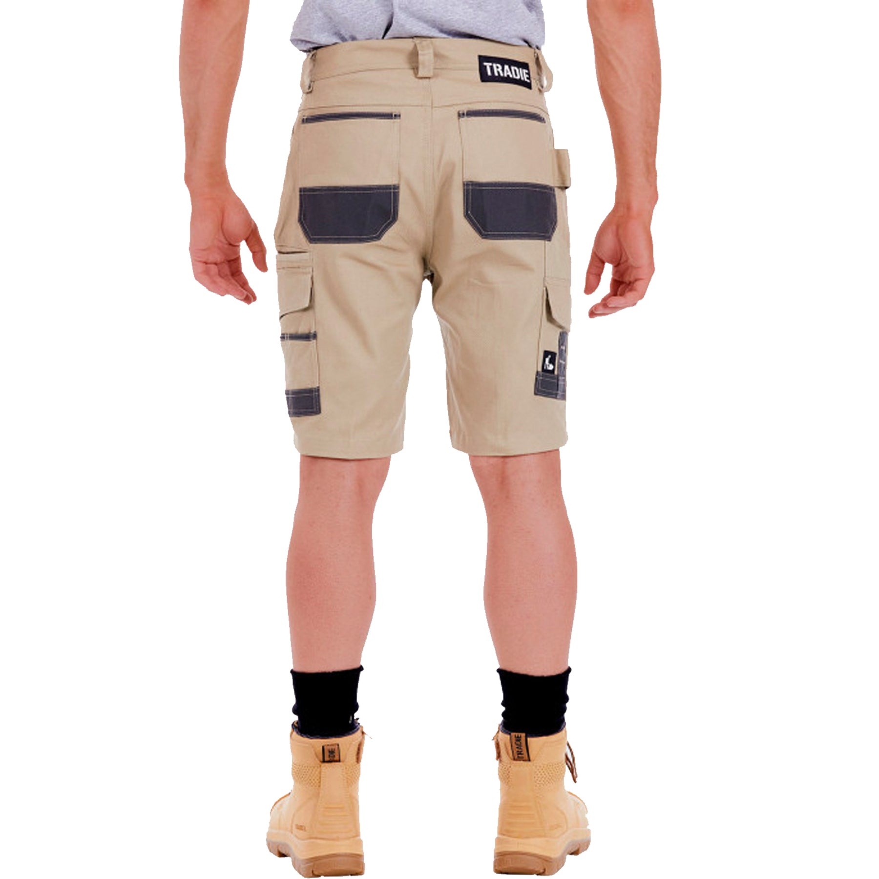 back view of tradie slim fit cargo shorts in khaki